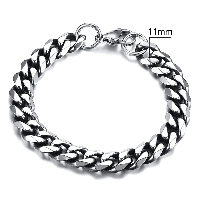 Silver chain bracelet on a white background with a measurement label.