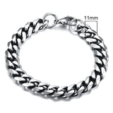 Silver chain bracelet on a white background with a measurement label.