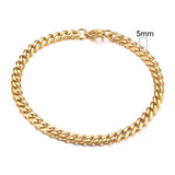 Gold chain bracelet with a measurement label on a white background