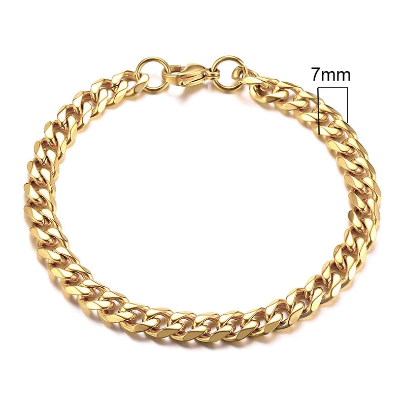 Gold chain bracelet with a measurement label on a white background