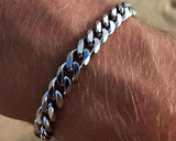 Silver chain bracelet on a wrist 