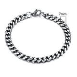 Silver chain bracelet with a 7mm width on a white background